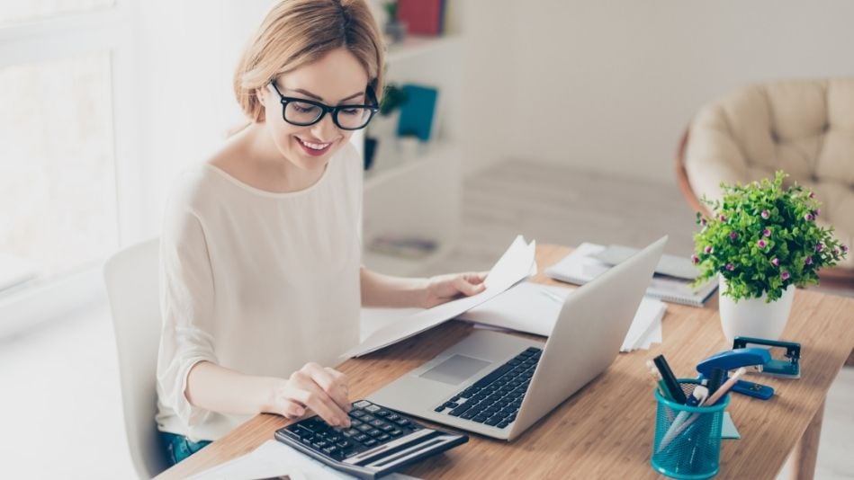 Woman with Laptop and Calculator